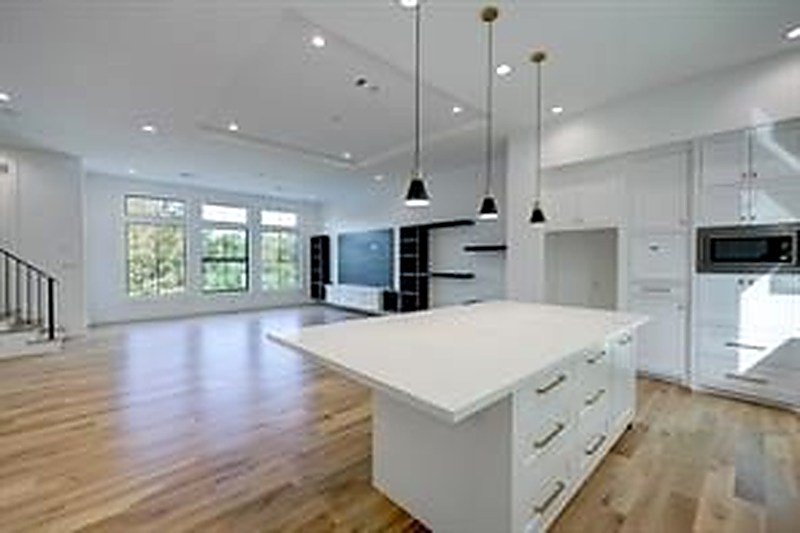 Kitchen with waterfall island and custom cabinetry