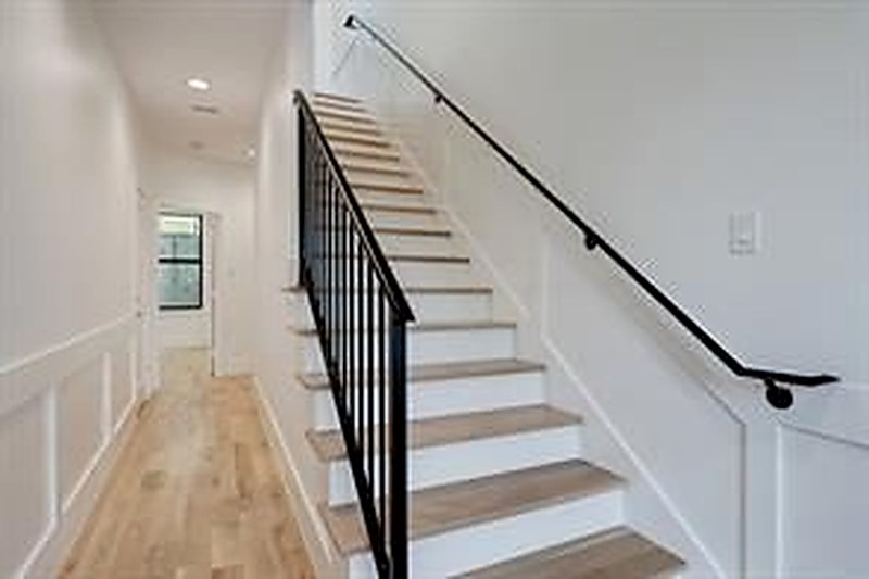 Staircase with iron railing